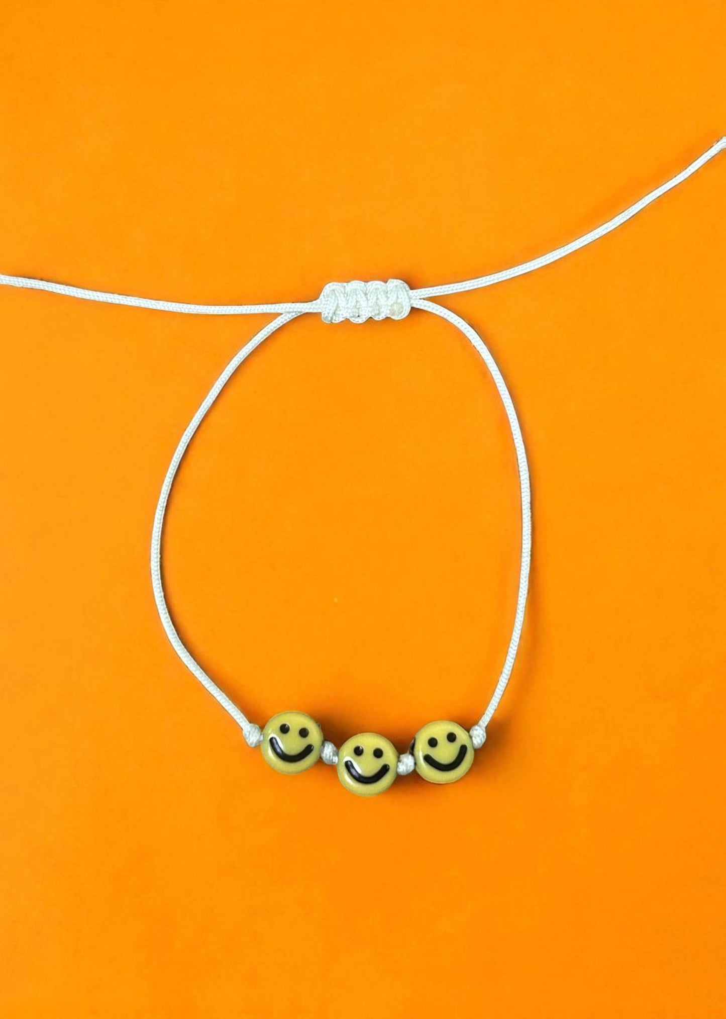 close up happy face bracelet beaded jewelry cute aesthetic detail design