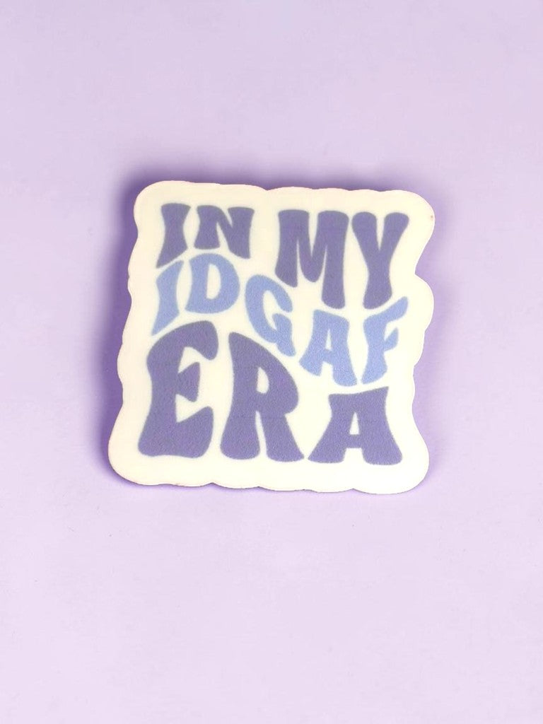 Permanent Sticker with 'IN MY IDGAF ERA' text on a purple background