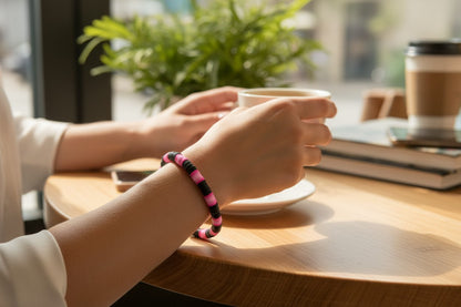 close up neon pink bracelet beaded jewelry aesthetic detail design