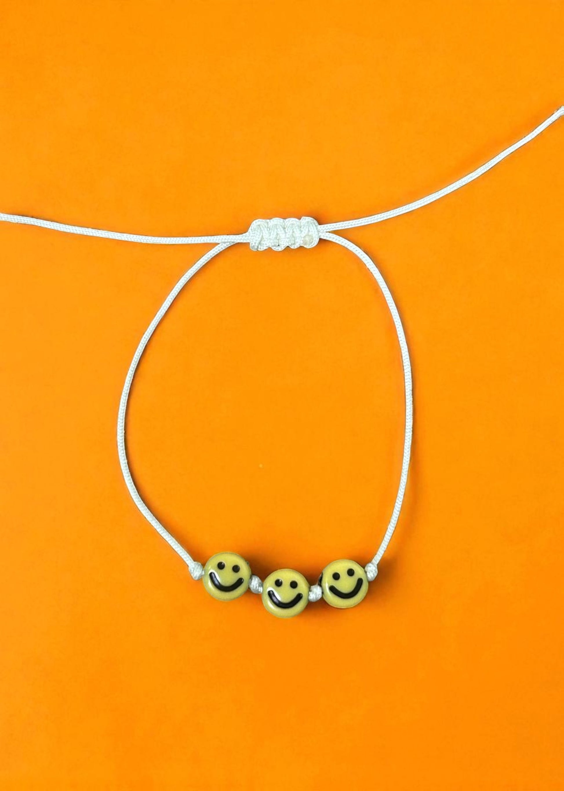 close up happy face bracelet beaded jewelry cute aesthetic detail design