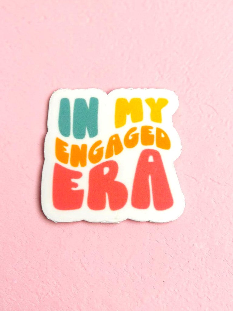 Permanent sticker with 'IN MY ENGAGED ERA' text on a pink background