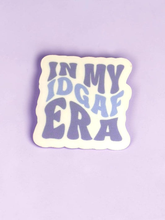 Permanent Sticker with 'IN MY IDGAF ERA' text on a purple background