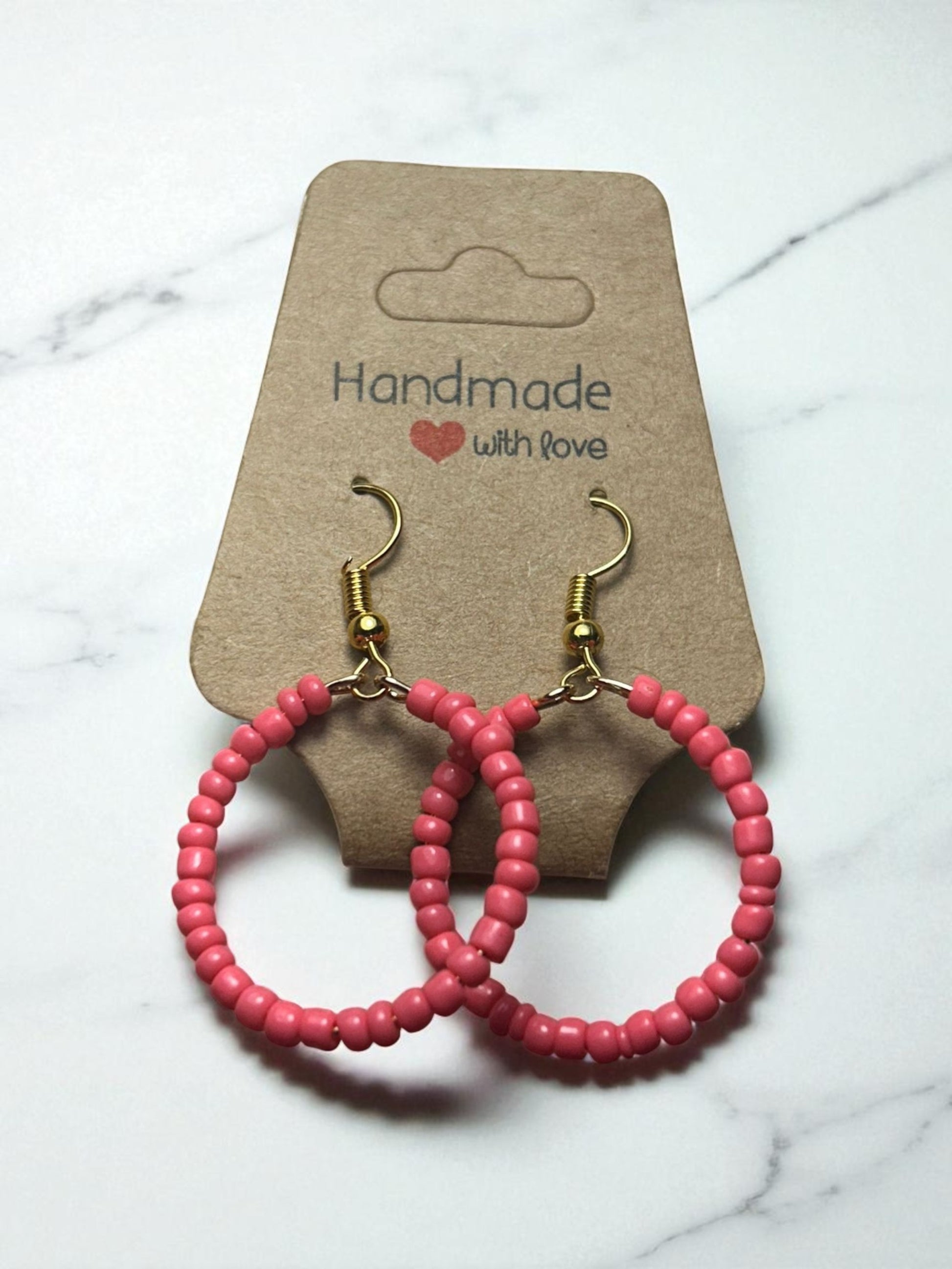 close up simple color earrings minimal aesthetic jewelry detail design