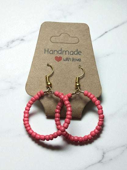 close up simple color earrings minimal aesthetic jewelry detail design