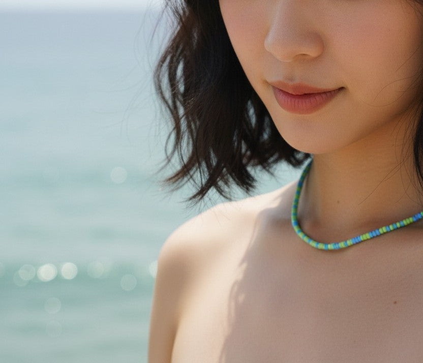 close up ocean beaded necklace beach jewelry aesthetic detail