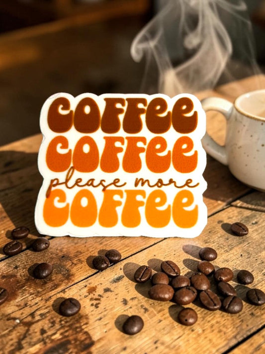 Permanent sticker with 'Coffee Coffee Please More Coffee' text on a wooden surface with coffee beans and a steaming cup.
