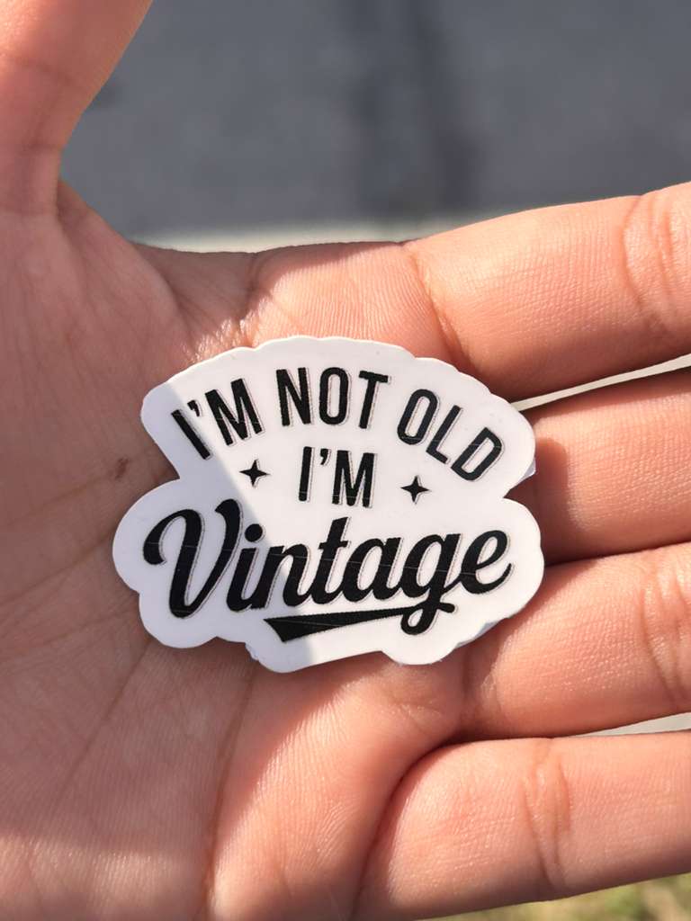 waterproof vinyl sticker on water bottle with quote i’m not old i’m vintage aesthetic style