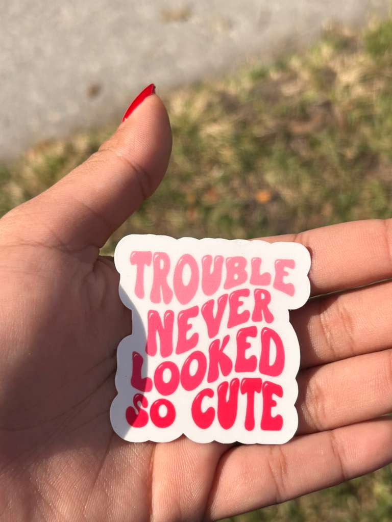 funny bold vinyl quote sticker trouble never looked so good applied on laptop or tumbler waterproof decal aesthetic style