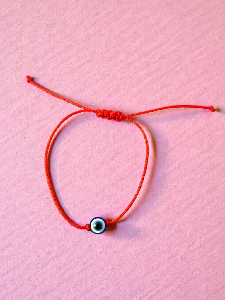 handmade evil eye amulet bracelet protection jewelry beaded close up aesthetic style