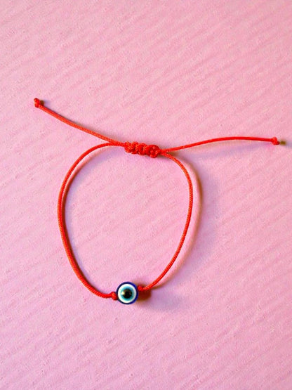 handmade evil eye amulet bracelet protection jewelry beaded close up aesthetic style