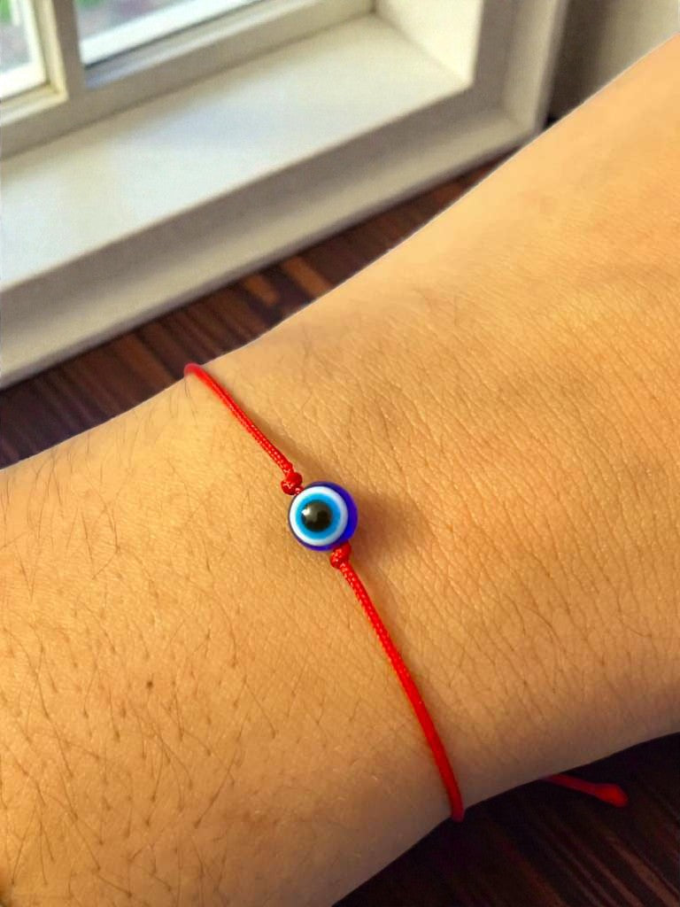 evil eye bracelet with amulet charm spiritual protection jewelry worn on wrist aesthetic look