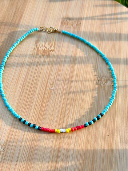 island inspired beaded necklace with bright colors summer aesthetic jewelry worn on model